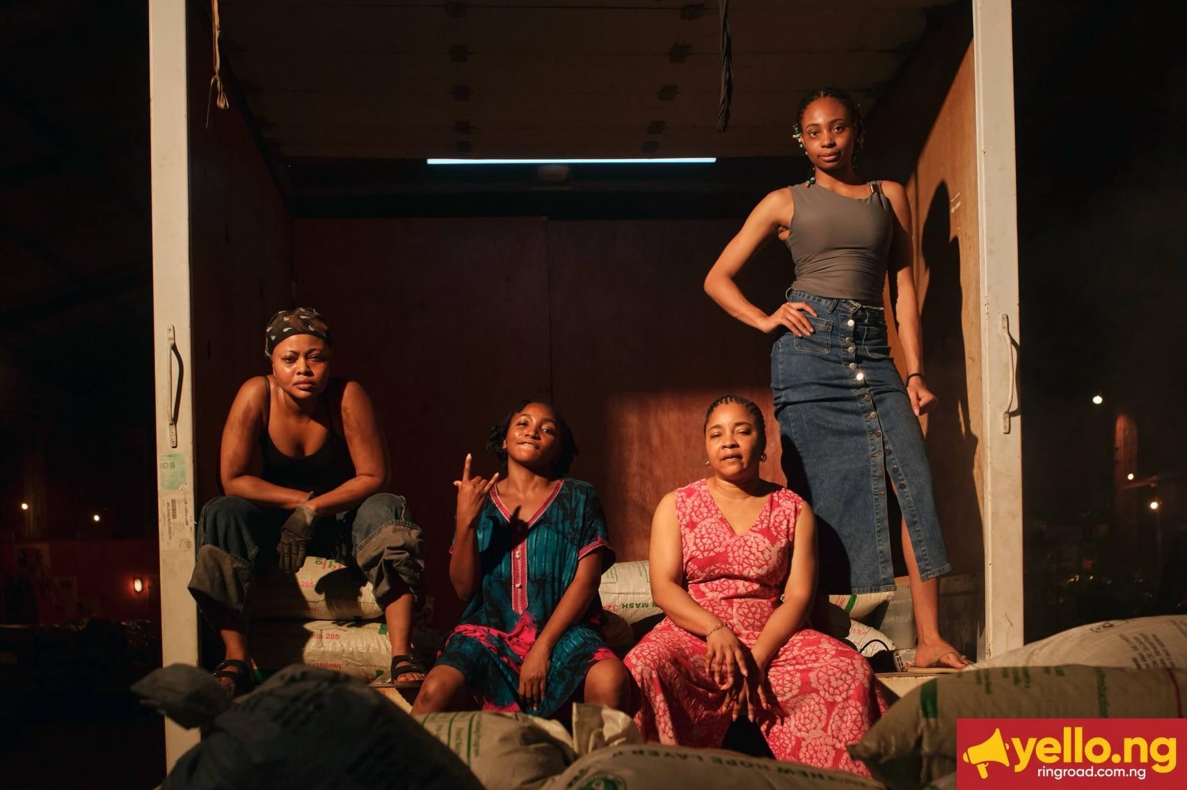 Omowunmi Dada, Teniola Aladese, Linda Ejiofor-Suleiman, and Susan Pwajok inside a cargo truck on the Black Market film set