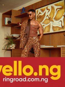 Denola Grey wearing a complete brown sequined mesh suit with gold bee top and retro aviator sunglasses for Onalaja SS27 at London Fashion Week
